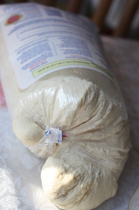 bread dough over rising