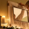 hanging mirror above mantel