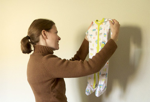Parting with sentimental baby clothes