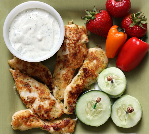 These Parmesan Ranch Chicken Tenders dipped in this delicious Greek Yogurt Ranch is such a healthy snack.
