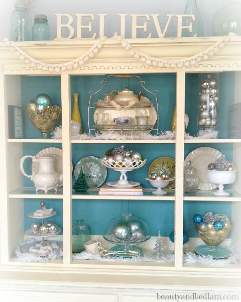 This gorgeous hutch, decorated for the holidays, was an old, dated brown 80's hutch. Amazing what a bit of paint can do.